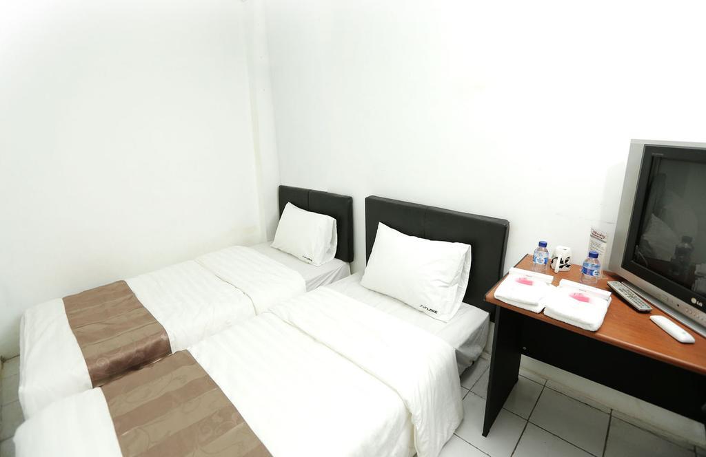 Отель Ds Colive Siliwangi Семаранг Номер фото